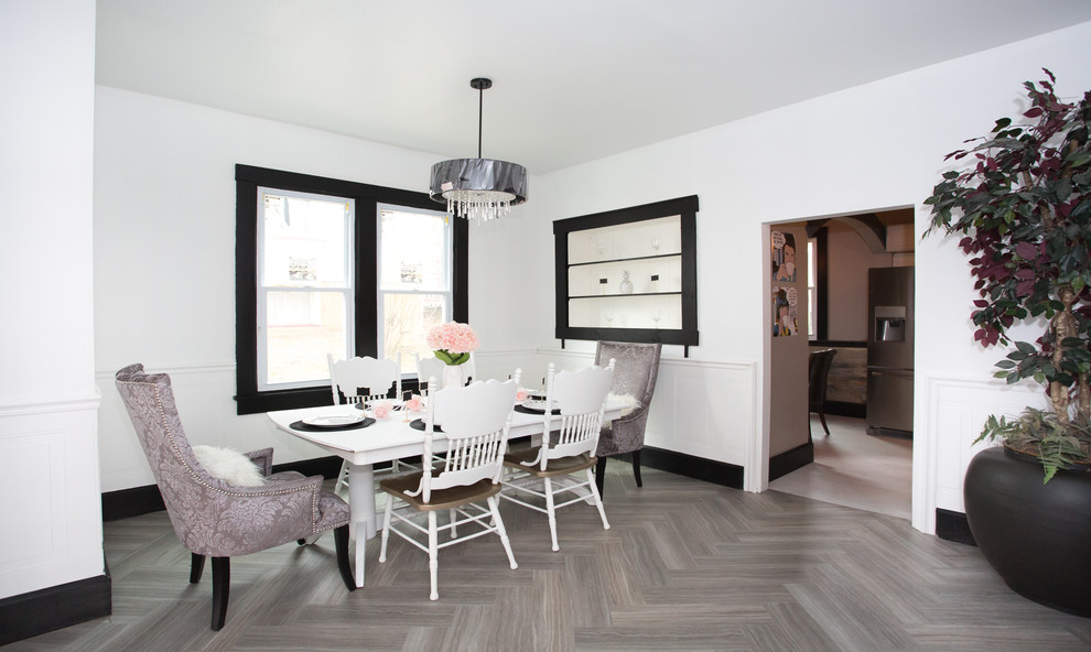 Example of a mid-sized transitional vinyl floor and gray floor enclosed dining room design