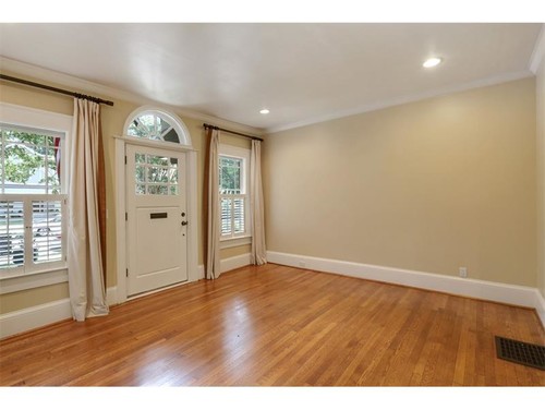Front door opens into the middle of living room. Help!