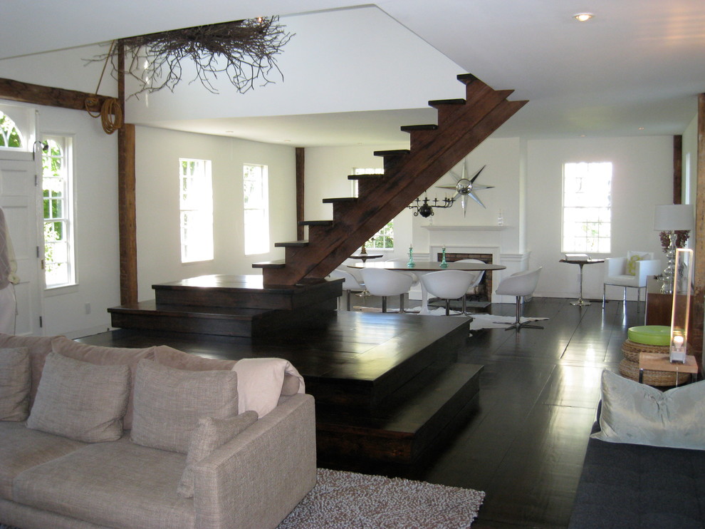 This is an example of a mid-sized traditional wood floating staircase in Burlington with open risers.