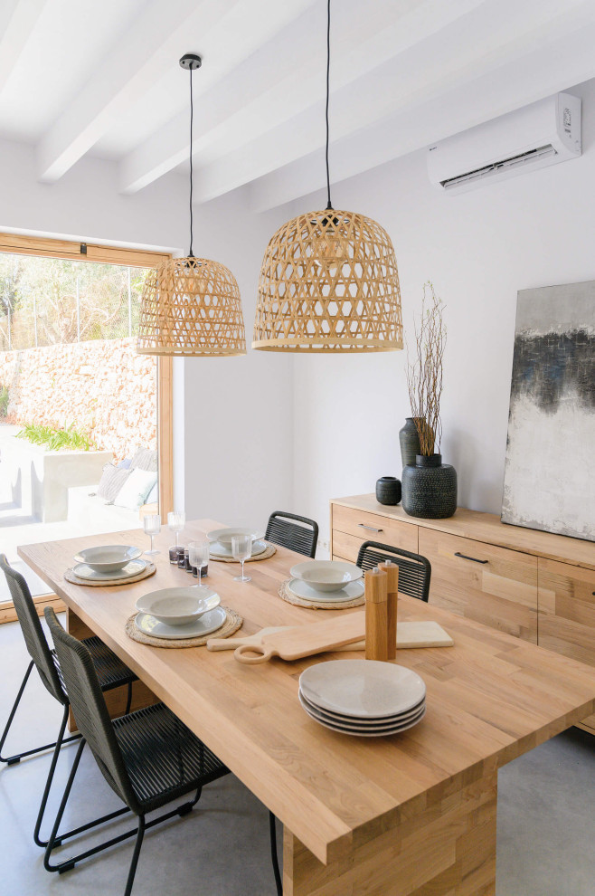 Photo of a mediterranean dining room in Palma de Mallorca.