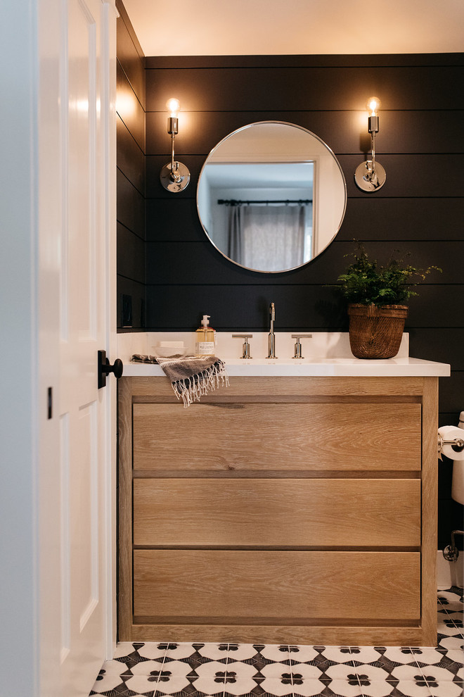 Bathroom - coastal multicolored floor bathroom idea in San Diego with open cabinets, brown cabinets, black walls and white countertops