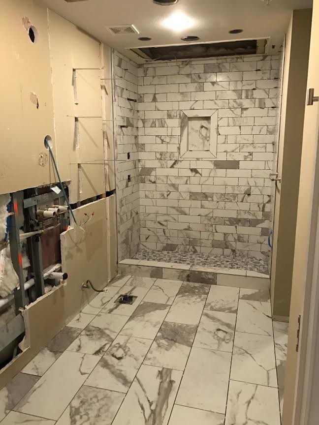 Mid-sized transitional ceramic tile open shower photo in Austin with an undermount sink