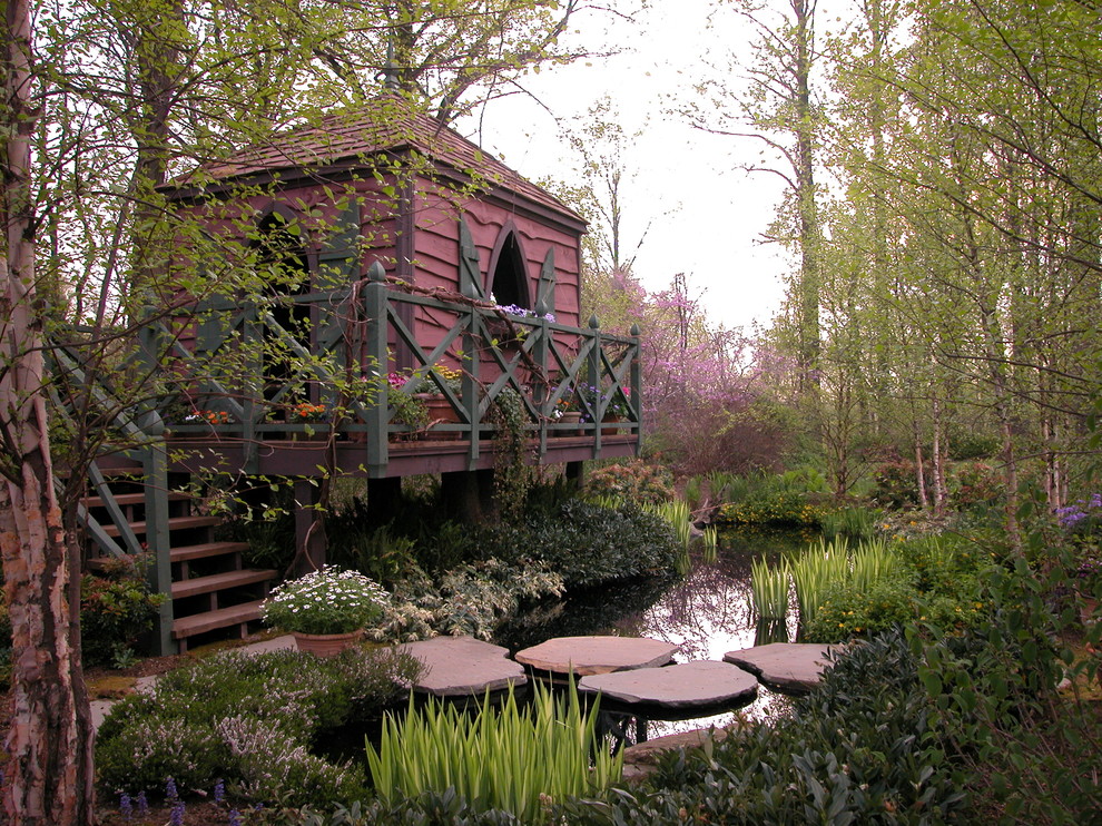 Photo of a country garden in New York with a water feature.