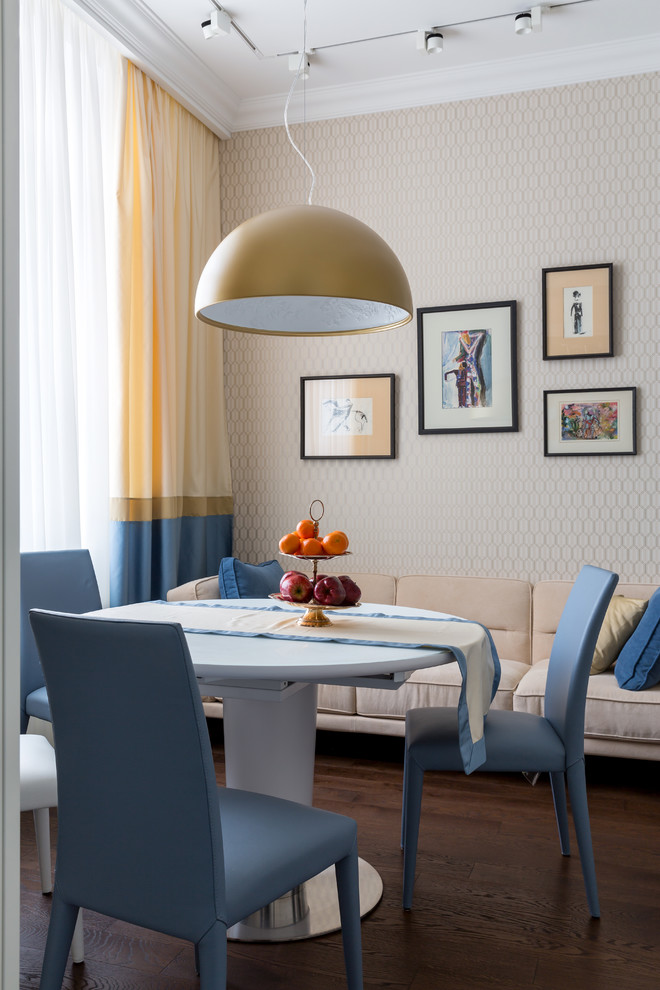 Inspiration for a contemporary dining room in Moscow with painted wood floors and brown floor.