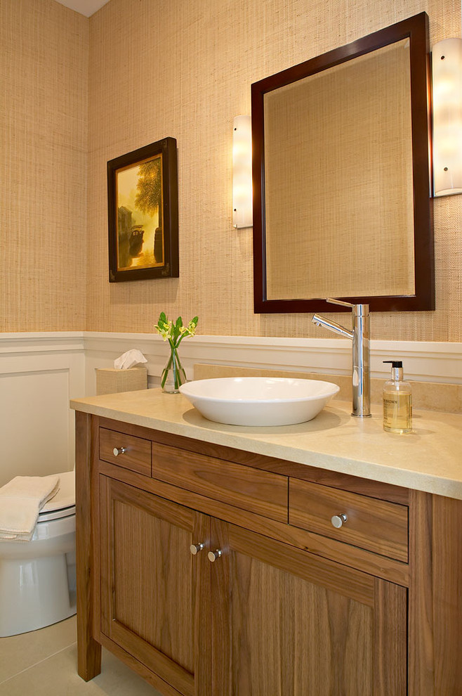 This is an example of a beach style powder room in New York with a vessel sink.