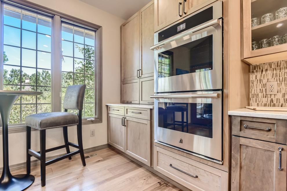 Example of a mountain style kitchen design in Denver