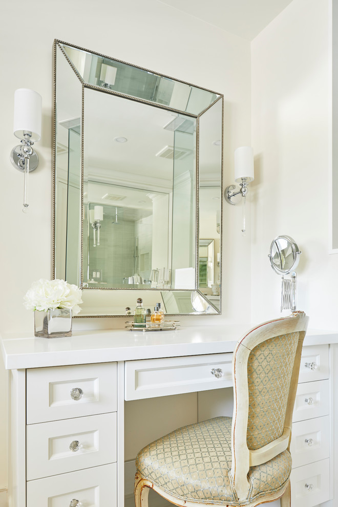 Inspiration for a large traditional master bathroom in Toronto with recessed-panel cabinets, white cabinets, a freestanding tub, a corner shower, gray tile, white walls, porcelain floors, an undermount sink, engineered quartz benchtops, white floor, a hinged shower door and white benchtops.
