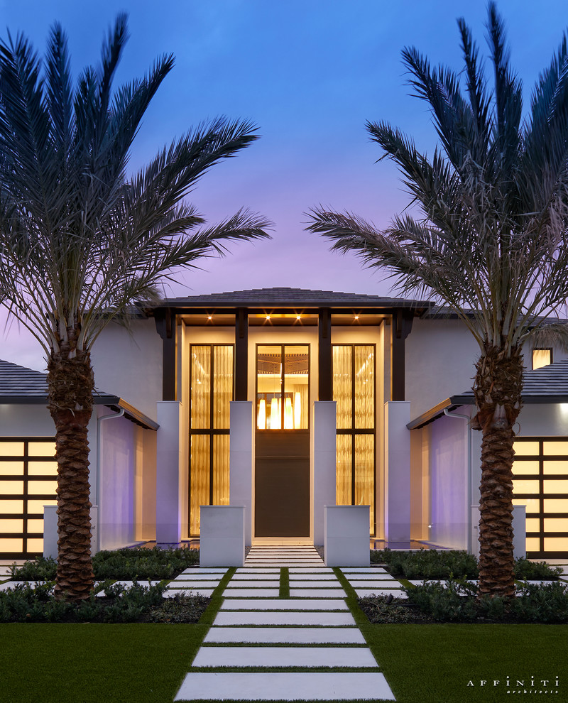 Transitional white two-story house exterior idea with a shingle roof