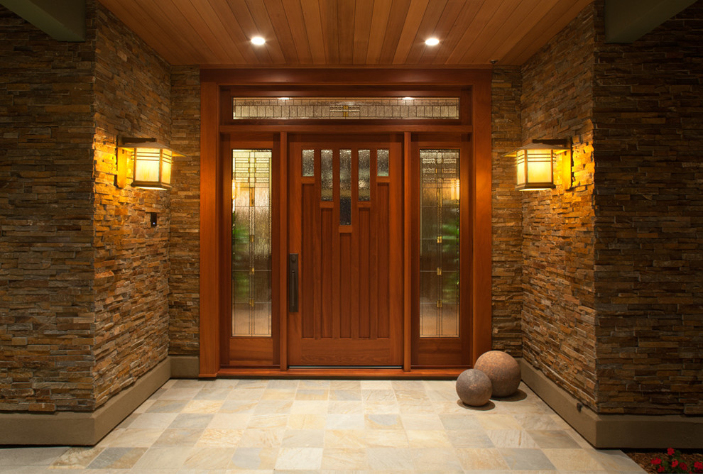 Design ideas for a mid-sized arts and crafts front door in San Diego with travertine floors, a single front door and a medium wood front door.