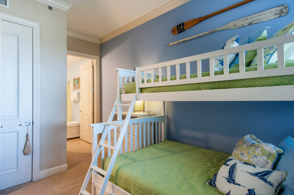 This is an example of a beach style kids' room in Miami.