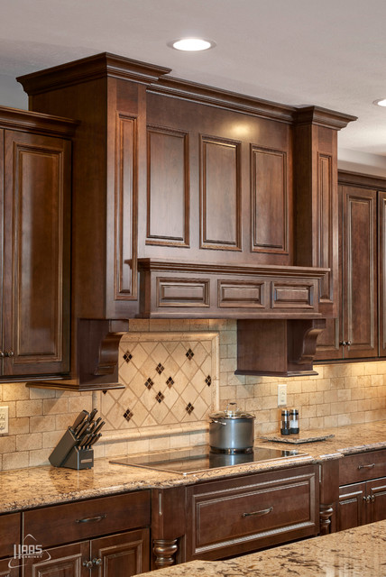 cool toned caraway kitchen | haas cabinet - traditional - kitchen