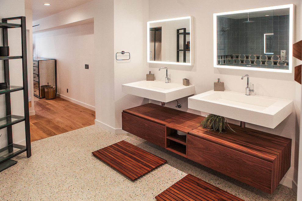 Design ideas for a mid-sized modern master bathroom in Los Angeles with open cabinets, brown cabinets, a freestanding tub, a curbless shower, a one-piece toilet, blue tile, subway tile, white walls, terrazzo floors, a wall-mount sink, yellow floor and an open shower.