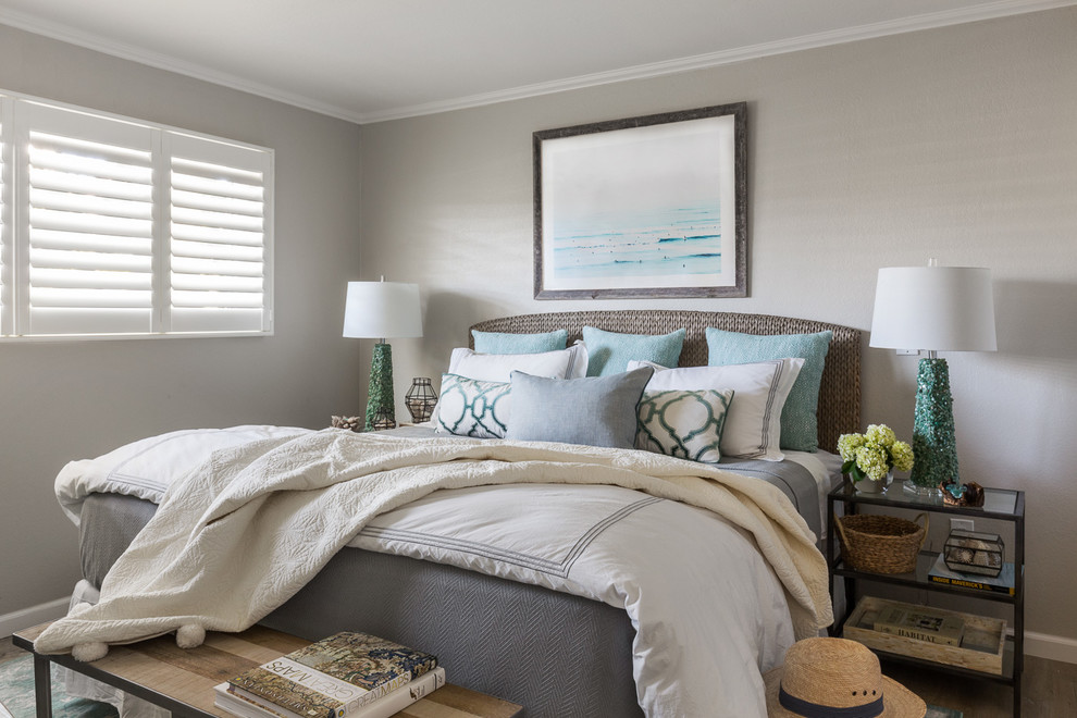 Photo of a beach style bedroom in San Francisco with grey walls.