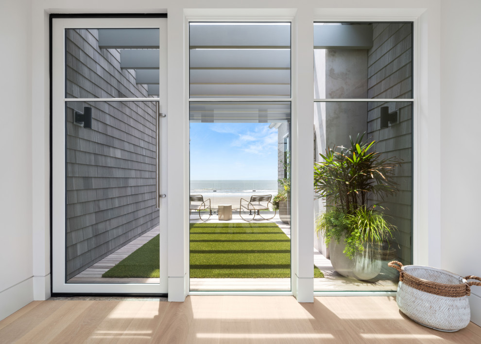 Example of a beach style balcony design in Charleston