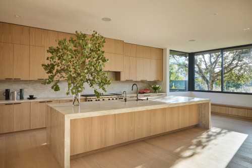 DIY-friendly RTA Cabinets in Canada with natural wood finish and spacious kitchen island