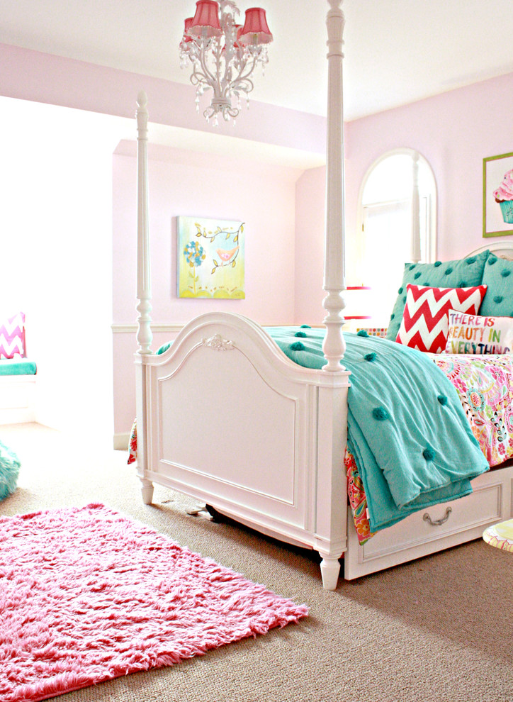 Photo of a traditional kids' bedroom for girls in Tampa with pink walls and carpet.