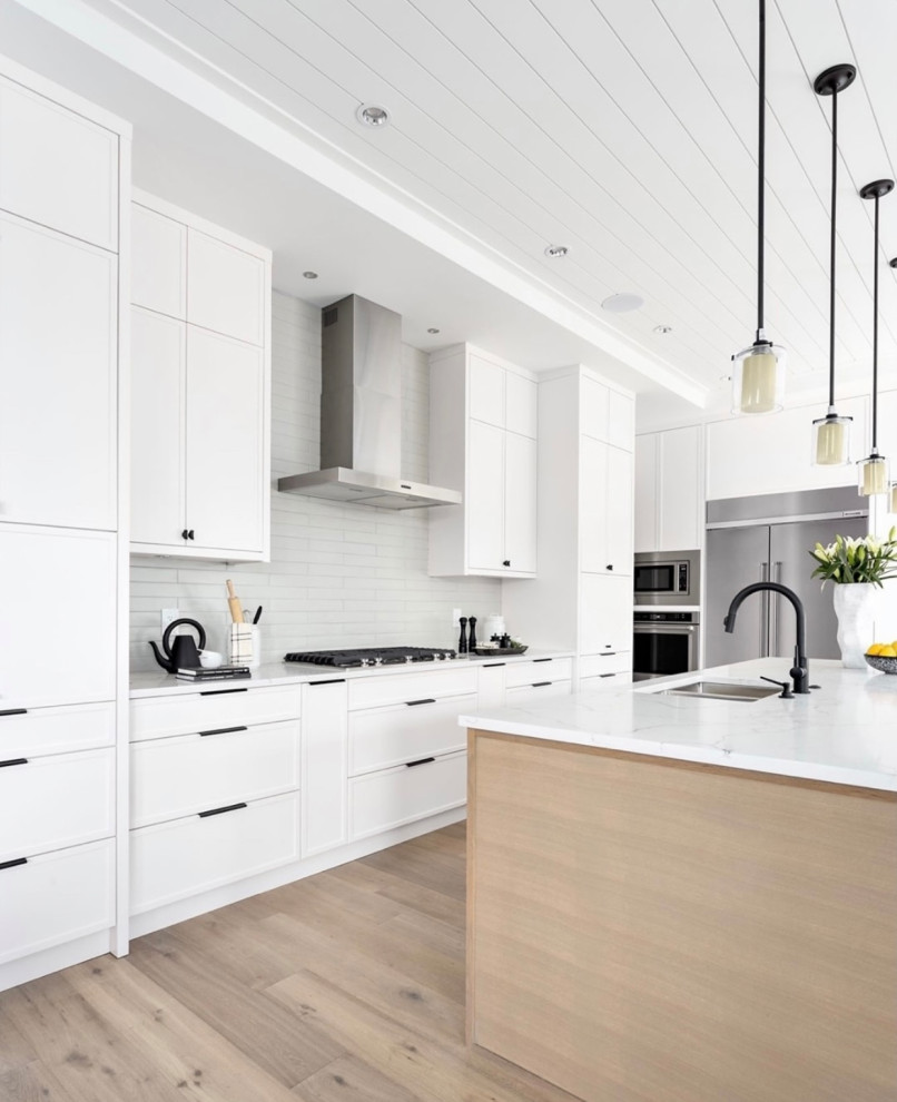 Example of a beach style kitchen design in Orange County