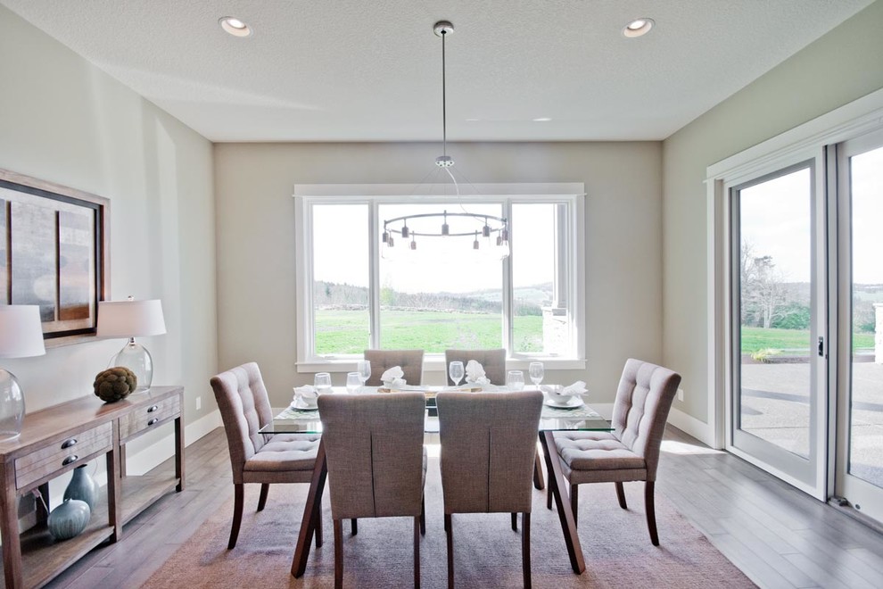 Design ideas for a transitional dining room in Portland.