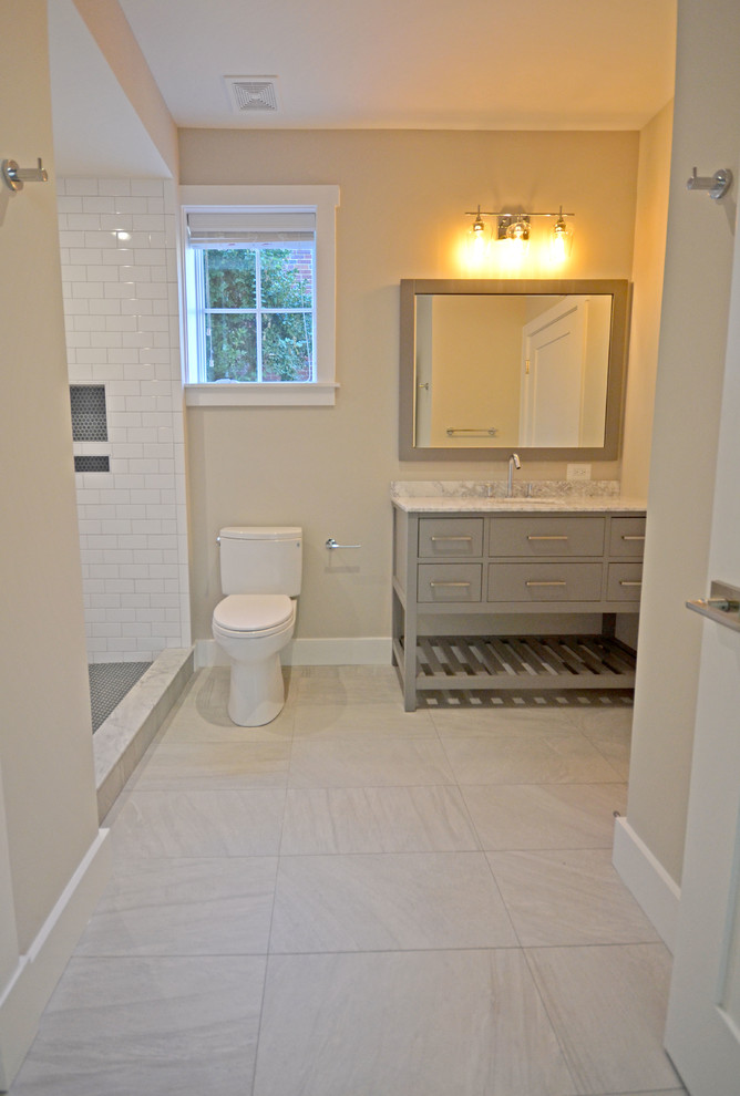 Contemporary kids bathroom in DC Metro with shaker cabinets, grey cabinets, an open shower, a two-piece toilet, beige tile, subway tile, grey walls, porcelain floors, an undermount sink, engineered quartz benchtops, grey floor and a shower curtain.