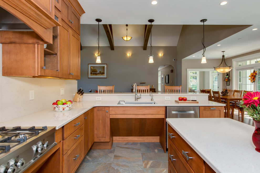 Open concept kitchen - huge transitional u-shaped open concept kitchen idea in Boston with an undermount sink, shaker cabinets, medium tone wood cabinets, quartz countertops, stone slab backsplash, stainless steel appliances and an island