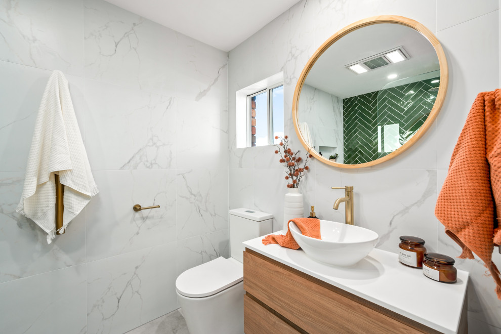 Small contemporary shower room bathroom in Central Coast with medium wood cabinets, a walk-in shower, a two-piece toilet, green tiles, white tiles, a vessel sink, an open shower, white worktops, a wall niche, a single sink and a floating vanity unit.