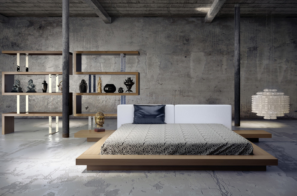 Expansive modern loft-style bedroom in Los Angeles with grey walls, concrete floors and a standard fireplace.
