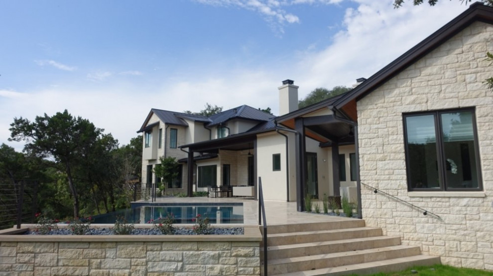 Example of a transitional exterior home design in Austin