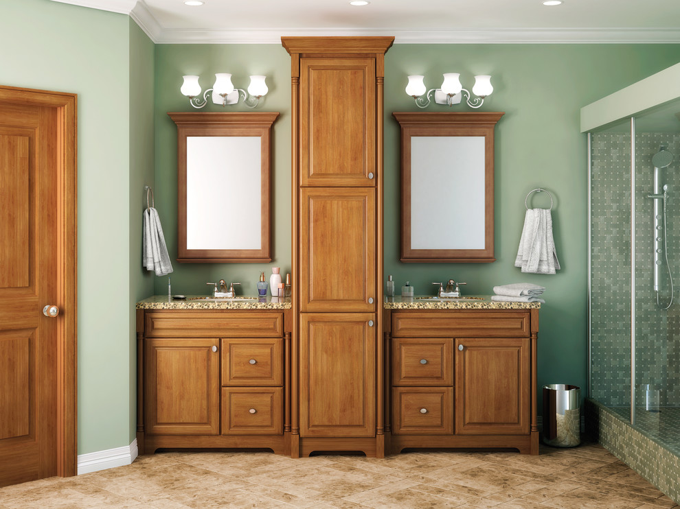 Inspiration for a large traditional master bathroom in Other with an integrated sink, raised-panel cabinets, an open shower, green walls, medium wood cabinets, porcelain floors, granite benchtops and beige floor.
