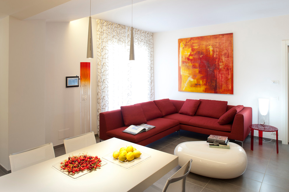 This is an example of a contemporary open concept living room in Catania-Palermo with white walls.