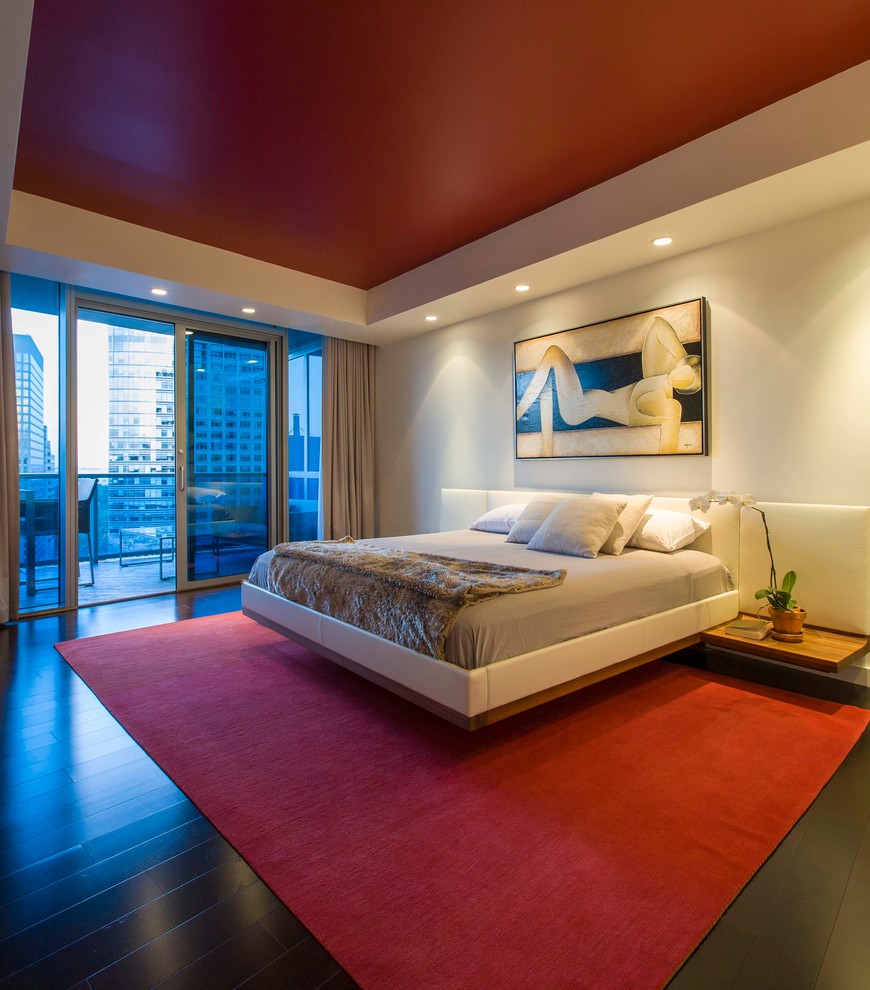 Inspiration for a mid-sized modern master bedroom in DC Metro with white walls and dark hardwood floors.