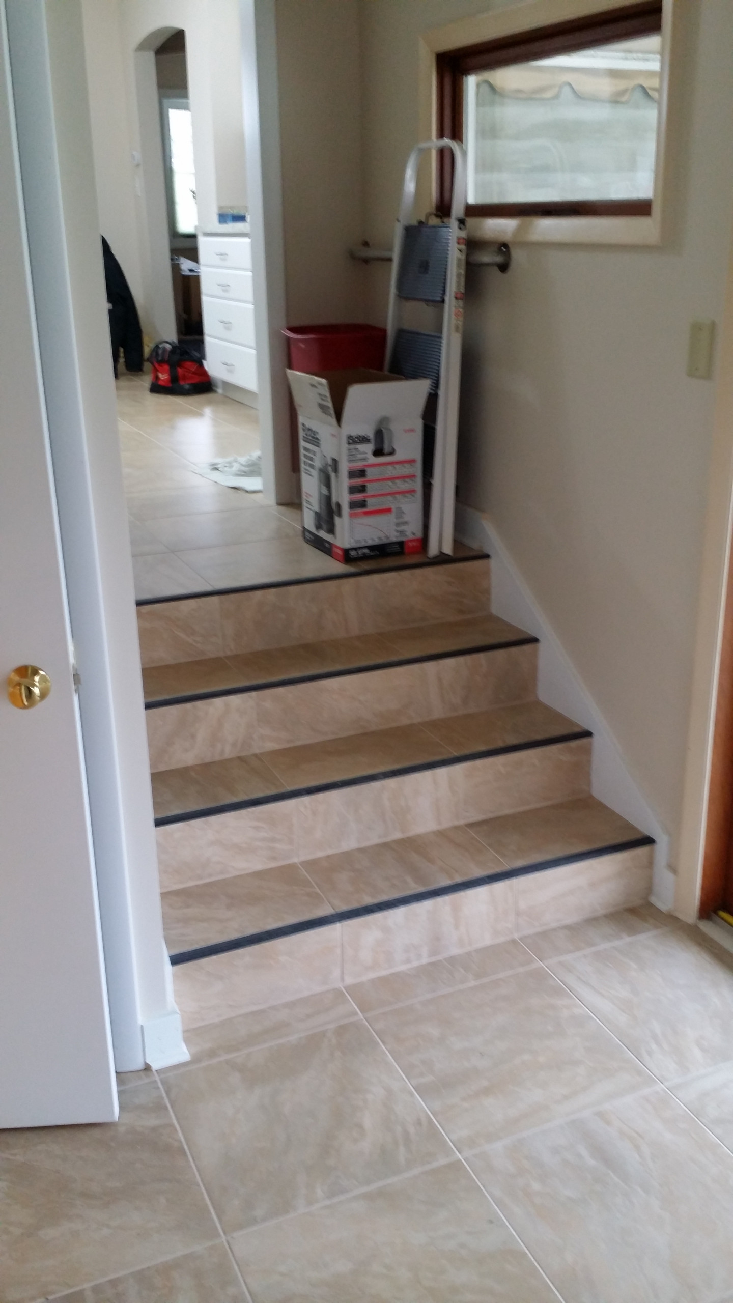 Tile stairs with rubber nosing