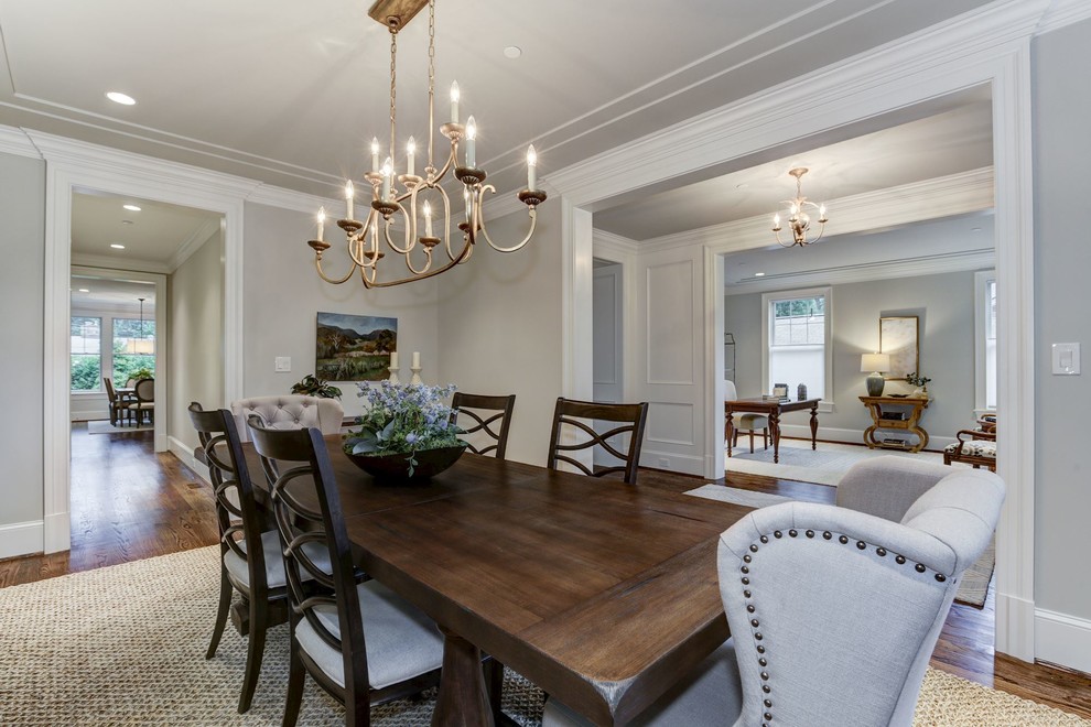 Transitional dining room in DC Metro with grey walls, dark hardwood floors and brown floor.