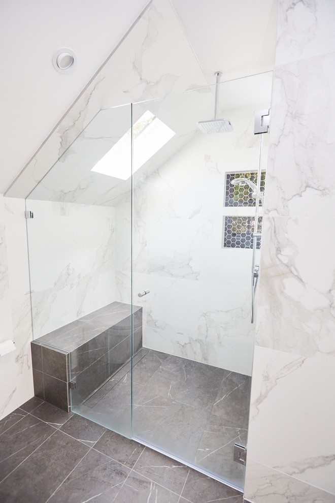 Master bathroom in Sydney with an alcove shower, multi-coloured tile, multi-coloured walls, multi-coloured floor, a hinged shower door, marble, marble floors and a freestanding tub.