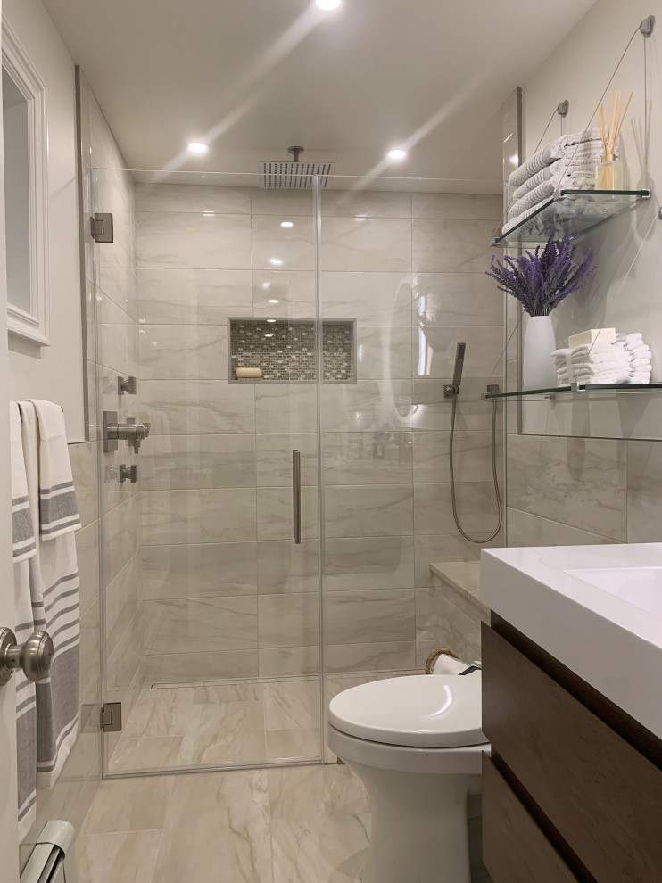 This is an example of a mid-sized modern 3/4 bathroom in New York with flat-panel cabinets, dark wood cabinets, a curbless shower, porcelain tile, a single vanity and a floating vanity.