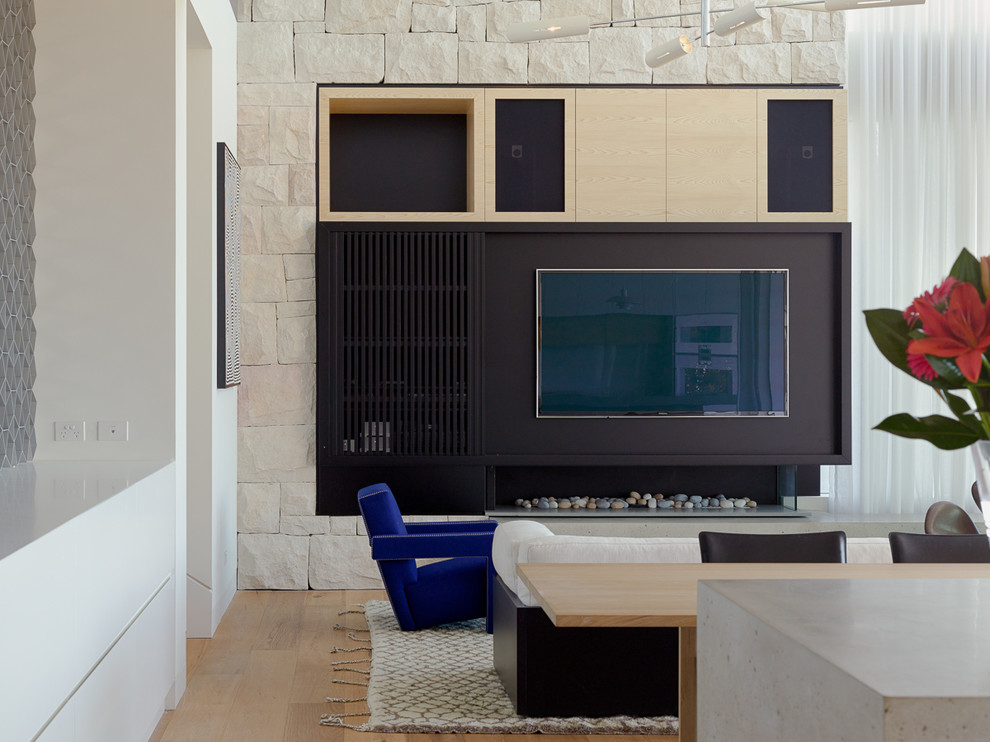 Inspiration for a contemporary open concept living room in Sydney with a built-in media wall.