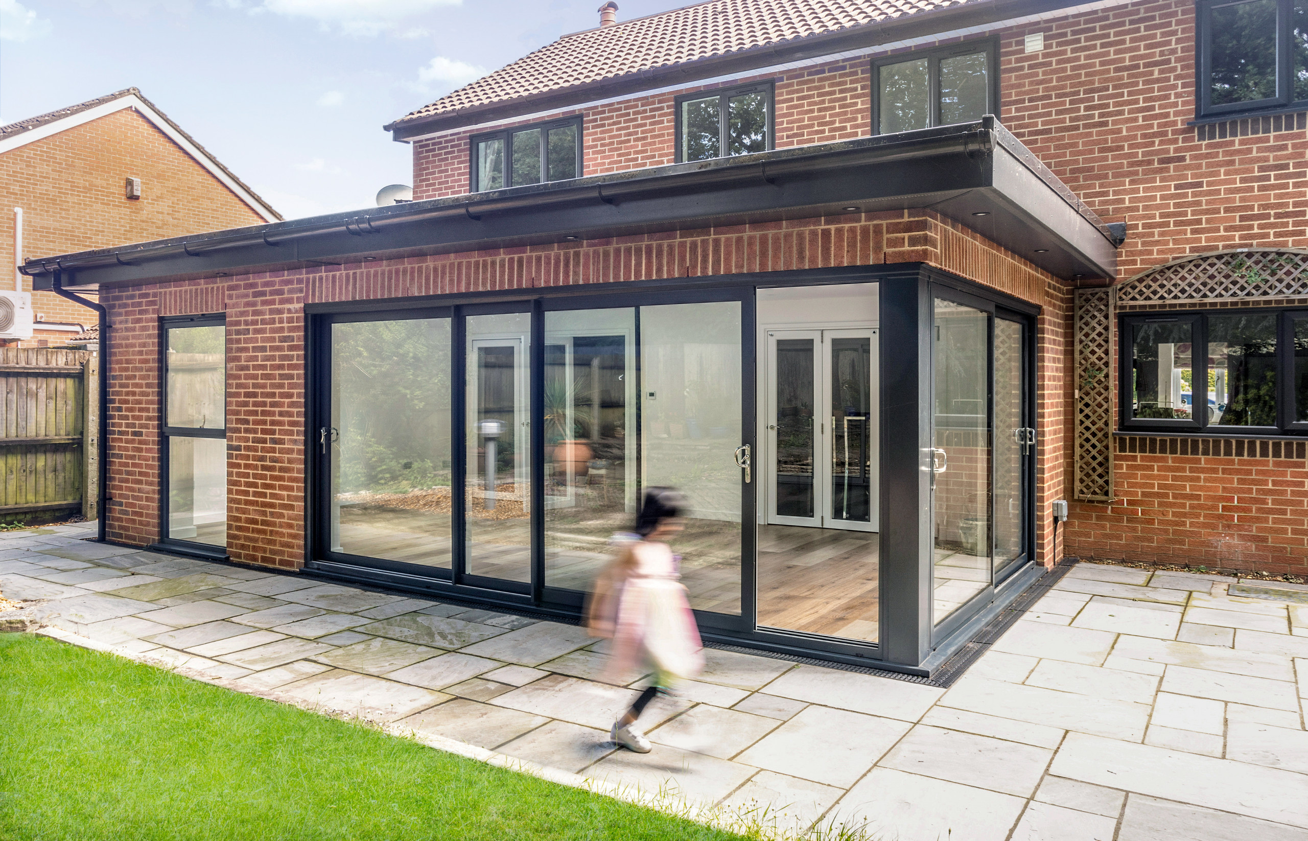 Exterior view of rear extension and sliding doors