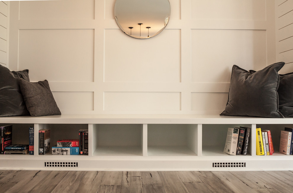 Example of a mid-sized transitional formal and open concept gray floor and medium tone wood floor dining room design in Omaha with white walls, no tv and no fireplace