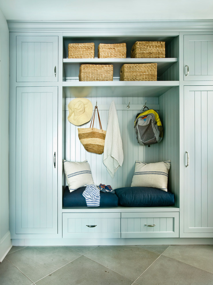 Mudroom - coastal mudroom idea in Jacksonville with blue walls