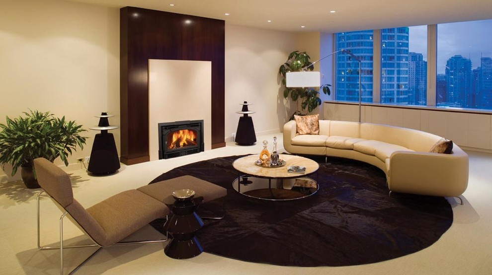 Inspiration for a mid-sized contemporary formal open concept living room in Providence with white walls, carpet, a standard fireplace, a tile fireplace surround, no tv and beige floor.