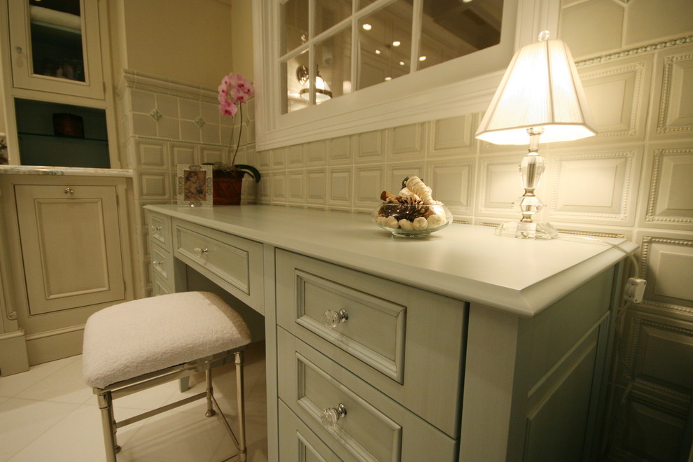 Bathroom - large transitional master gray tile bathroom idea in Chicago with recessed-panel cabinets, distressed cabinets, marble countertops and beige walls