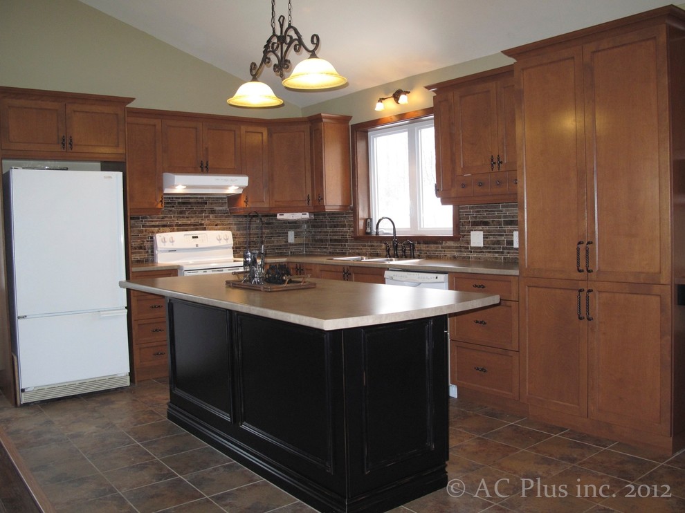 Traditional l-shaped eat-in kitchen in Montreal with a drop-in sink, shaker cabinets, brown cabinets, laminate benchtops, brown splashback, stone tile splashback and white appliances.