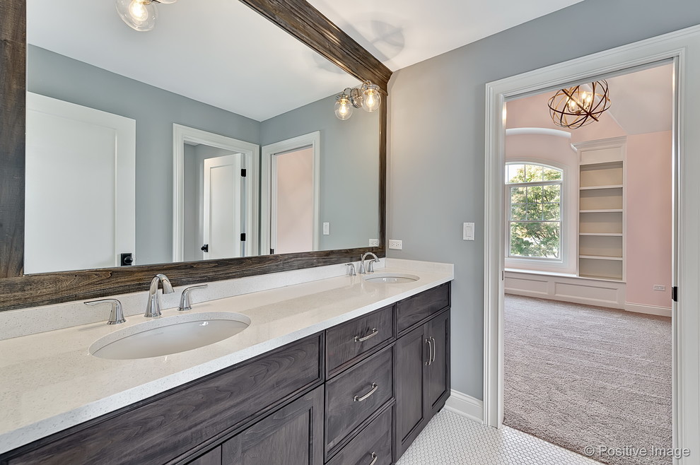 Photo of a mid-sized arts and crafts master bathroom in Chicago with shaker cabinets, white cabinets, an undermount tub, a corner shower, grey walls, marble floors, an undermount sink, marble benchtops, a two-piece toilet, white tile, white floor and a hinged shower door.