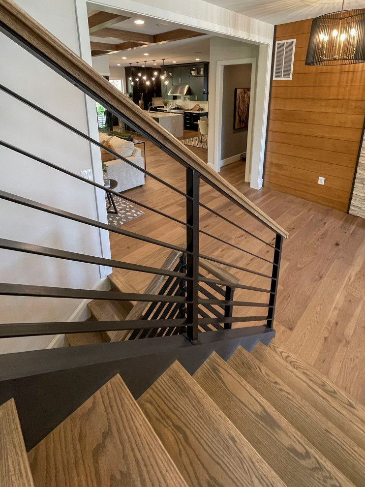Inspiration for a large contemporary wooden straight mixed material railing and wall paneling staircase remodel in DC Metro
