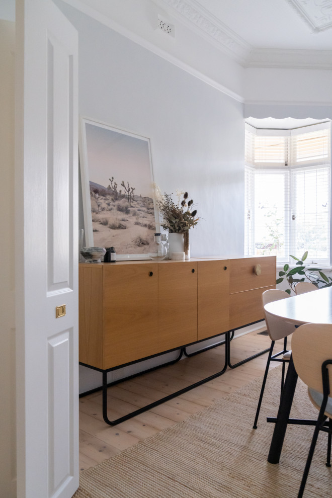Photo of a midcentury dining room in Melbourne.