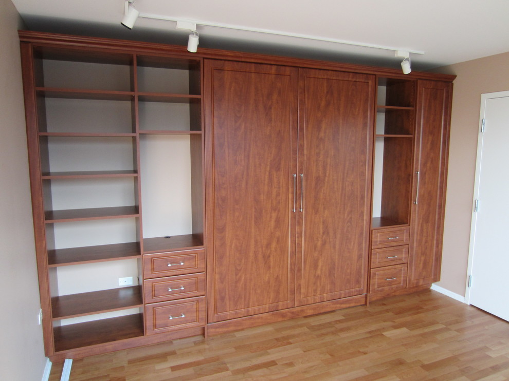 Example of a transitional bedroom design in Chicago