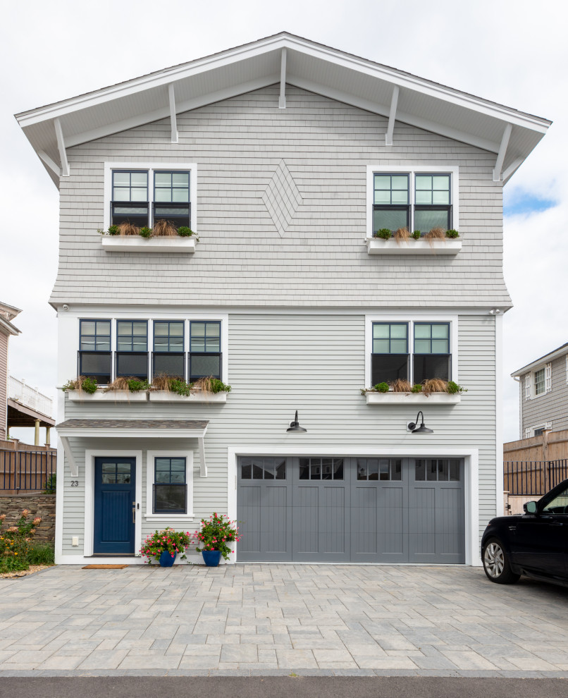 Example of a beach style garage design in Boston