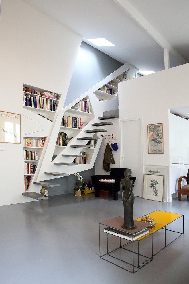 Mid-sized contemporary metal floating staircase in Paris with open risers.