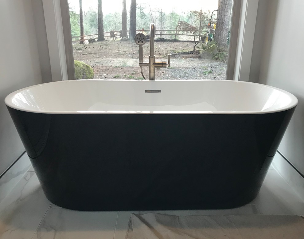 Design ideas for a large contemporary master bathroom in Portland with shaker cabinets, black cabinets, a freestanding tub, a double shower, a one-piece toilet, gray tile, porcelain tile, grey walls, porcelain floors, a trough sink, engineered quartz benchtops, multi-coloured floor, a hinged shower door and white benchtops.