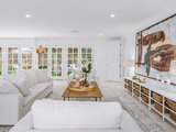 Beach Style Living Room by Joel Reis Architecture and Real Estate Photography