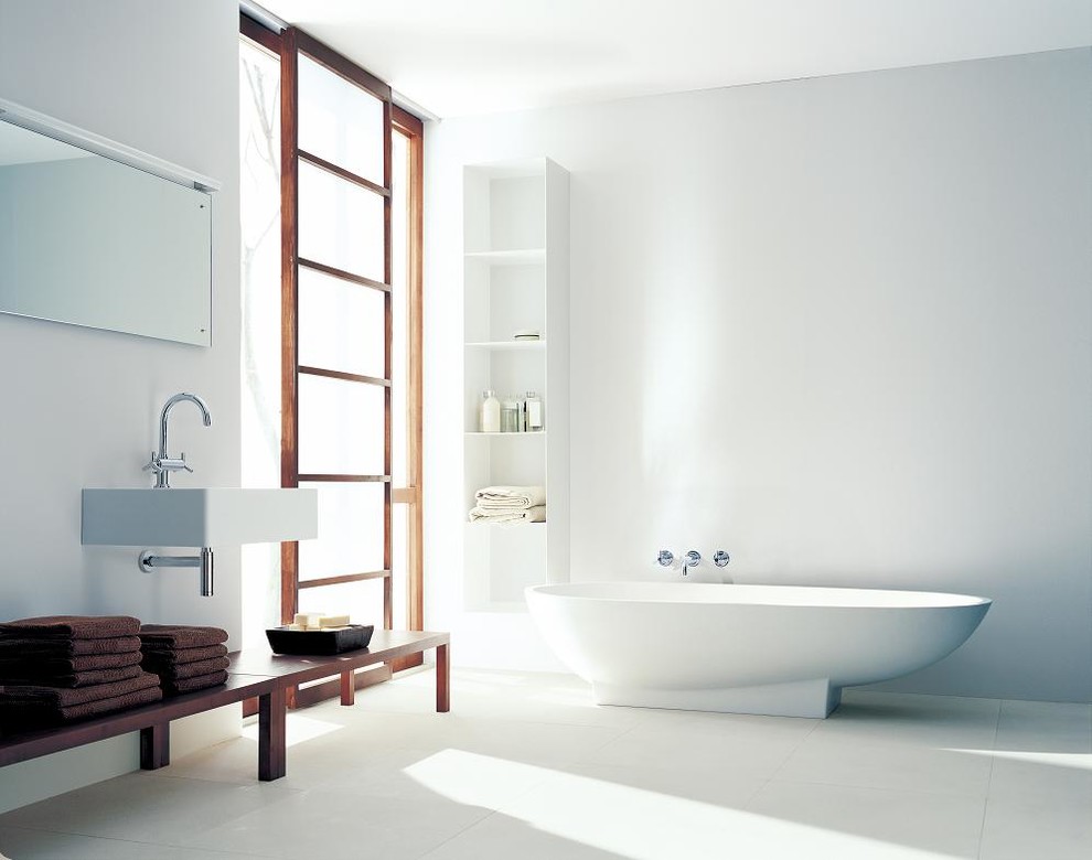 Design ideas for a modern master bathroom in Tokyo Suburbs with a wall-mount sink, open cabinets, white cabinets, a freestanding tub and white walls.
